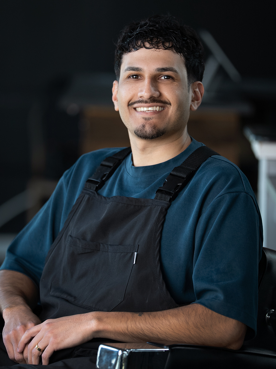 Ivan - Barber at District Barbershop Near Southside