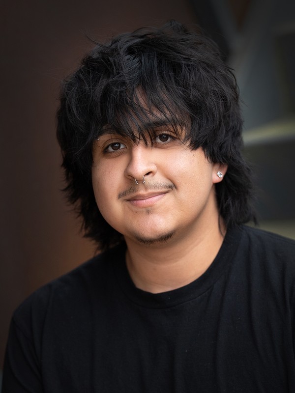 Kia - Barber at District Barbershop Near Southside